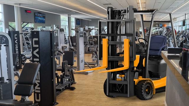 Attempt #2 -- different gym photo.

Compositing is marginally better, with the layering, and no vampire forklift issue. But then also no free weights in photo.