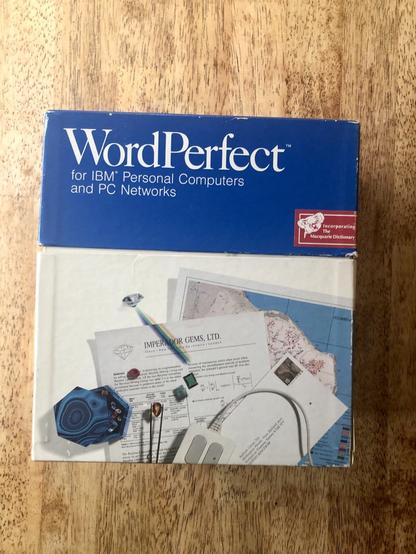 A blue and white box of WordPerfect software from another era of computing.