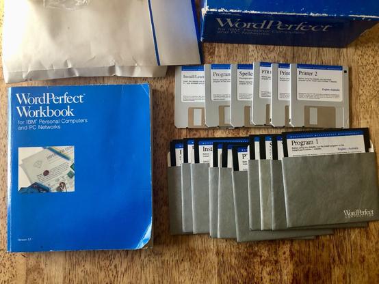 A blue and white box of WordPerfect software from another era of computing.