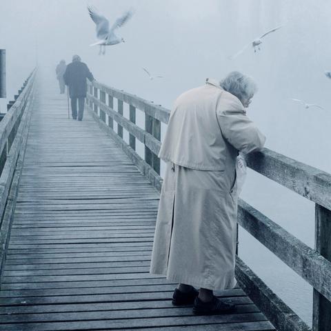 Print - Churchgoers on the bridge to the island form book WERD by photographer Marco Zedler