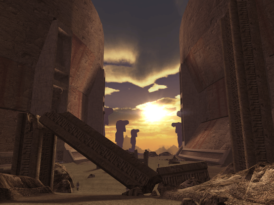 An arid valley with some eroded stone pillars fallen around the centre, framed on either side by two enormous ancient structures. In the far distance are two rows of statues bowing toward each other, and the yellow sun breaking through dense cloud. Taken on Korriban in Star Wars: Knights of the Old Republic.