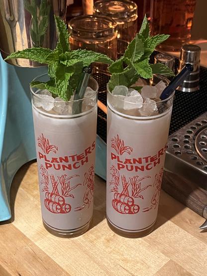 A round of Planter’s Punch in vintage Planter’s Punch glasses.