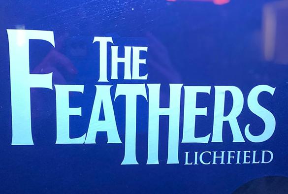 The Feathers sign
