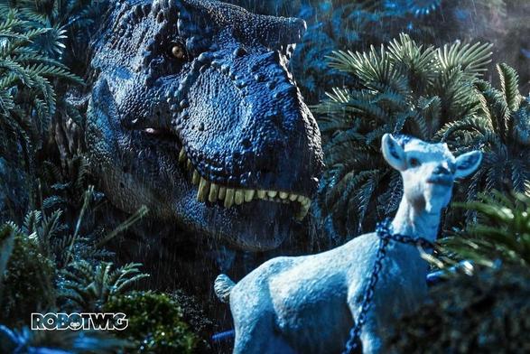 Trex appears from the bushes on an unsuspecting goat that's looking in the opposite direction