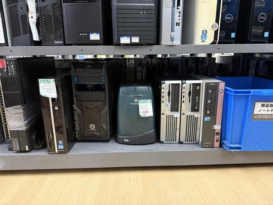 Shelves of old PCs of dubious value.

In the middle is a SiliconGraphics O2