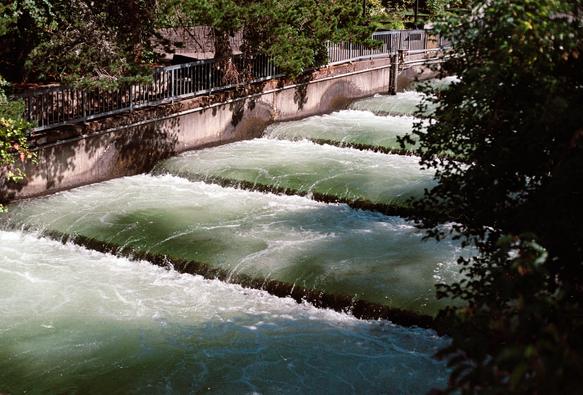 A photo of green-looking water going down a bunch of steps from the top (right) to the bottom (left)

It's a very pretty green with the water foaming white over it.