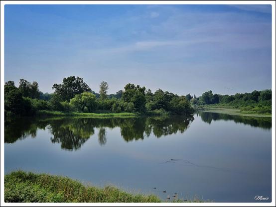 Bildbeschreibung:
Blick auf den nahezu spiegelglatten Ostorfer See.