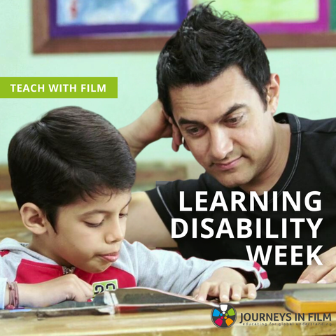In a film still from Like Stars on Earth, a young Indian boy sits at a school desk reading a book, while his teacher looks on fondly.

Text says: "Learning Disability Week. Teach with Film. Journeys in Film."
