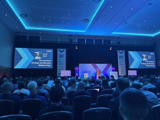 the technical decision making stage at lead dev conference, the host suhail is doing the stage introduction