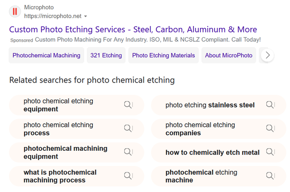 Bing ads with a light-gray background for sitelinks and "Related searches" with a light-orange background.