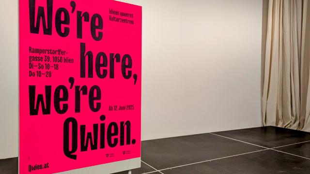 Photo of event poster for opening of new QWIEN HQ on 11 June, saying "We're here, we're Qwien".