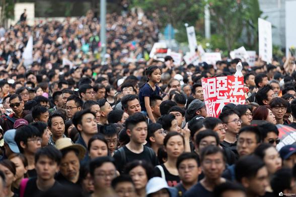 A sea of people in Admiralty on Hong Kong Island marching in opposition to the proposed extradition bill and against police brutality.