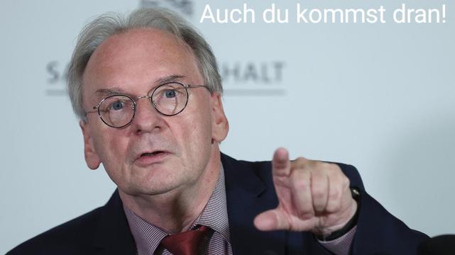 Rainer Haseloff, zeigt mit finger, spruch: auch du kommst dran!