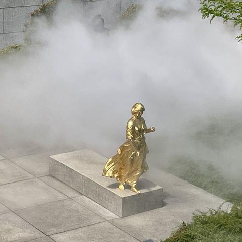 Fog sculpture and classical sculptures in the garden of Neue Nationalgalerie