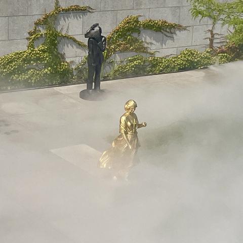 Fog sculpture and classical sculptures in the garden of Neue Nationalgalerie
