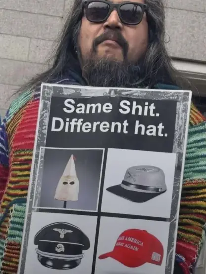 Guy holding sign: Same Shit. Different Hat.

KKK hat, Confederate Hat, Nazi hat, MAGA hat
