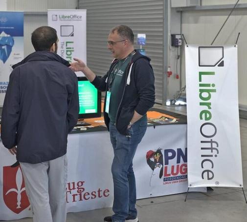 Photo of LibreOffice stand and attendees