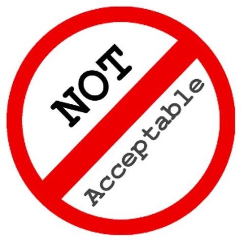 Sign stating “NOT Acceptable”