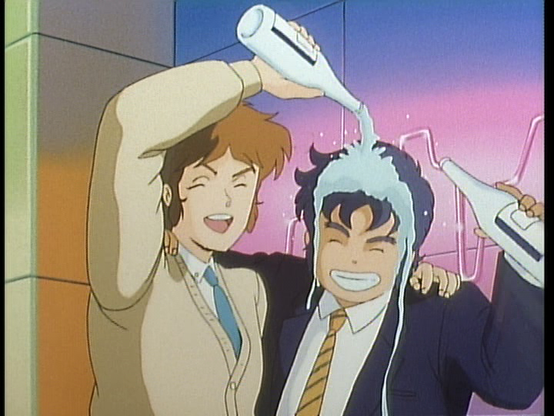 It's Kento and Cye. They look they're at a party. Cye has one arm around Kento, and is using the other hand to pour something on Kento's head.
