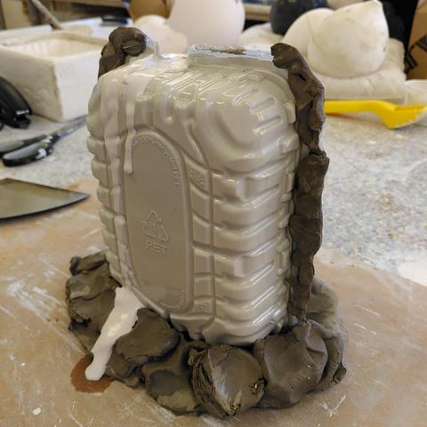 Making the plaster mold of the body part of the pitcher with plastic containers