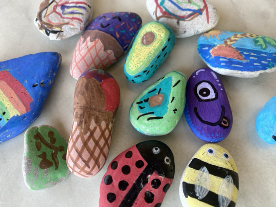 pebbles, dry and painted in vivid colours