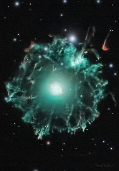 Faint filaments halo the Cat's Eye Nebula in this visible light image.