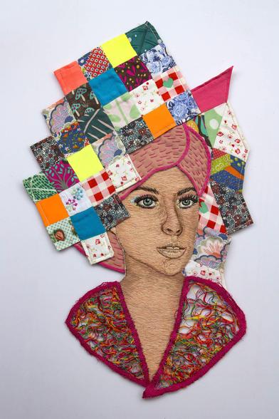 A textile artwork depicting a woman with colorful patchwork textile on her head, wearing an intricately designed garment with vibrant embroidery and lace detailing at the neckline.