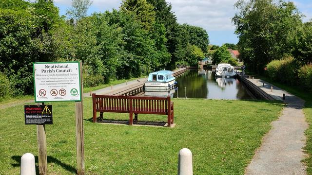 Singing the Blues moored at Neatishead Staithe