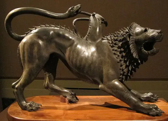 The image features a bronze sculpture of a lion, which appears to have a stylized or mythological quality. The lion is depicted with an extended posture, showcasing its strength and detailed features, such as a flowing mane and muscular body. Additionally, there is a figure or creature depicted interacting with the lion, possibly indicating a specific narrative or symbolic interpretation. The sculpture is likely displayed on a wooden base, highlighting its artistic craftsmanship.
Image Credits: Wikimedia / sailko / CC BY-SA 3.0