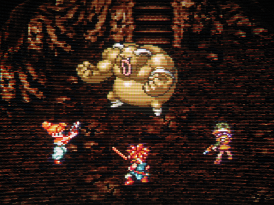 Masa and Mune have merged into a massive, muscled beast man. Marle, Crono and Lucca draw their weapons and prepare to have their mettle tested.