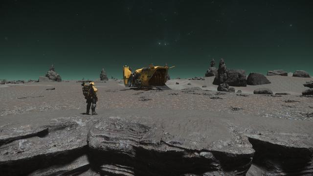 Star citizen screenshot: A yellow "Cutter" space craft landed on a moon. The rear cargo hatch is open. An astronaut in a yellow space suite is standing next to it.