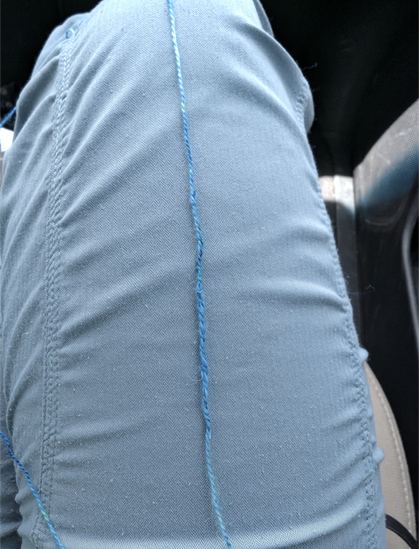 Russian splice with both ends trimmed, looking like a slightly bumpy section of yarn
