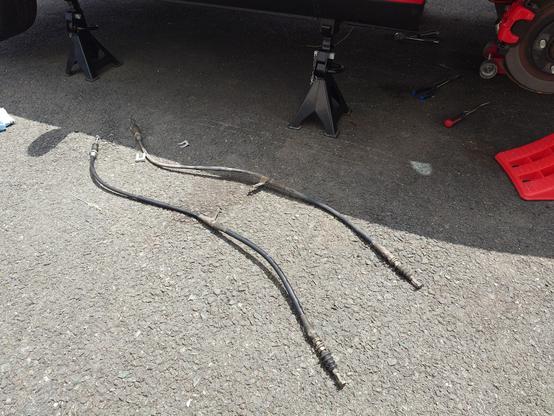 Parking brake cables, port and starboard, one side cleaned up and the other still a wee bit scummy