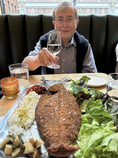 Andy van Dam raises a glass of wine over his dinner at Gift Horse, Oberlin Restaurant, Providence RI 30 Jun 2024

Crispy Whole Fish [fluke] Ssam, Banchun, Rice, Spicy Peanut Ssamjang, local butter lettuce. Split the fish along the spine, fold fish open open, enjoy a bite of fish with crunchy crust in a lettuce leaf with rice, Banchun of your choice + SSamjang.