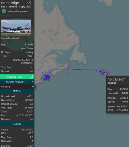 Two Stratotanker tanker airplanes heading across the ocean towards europe