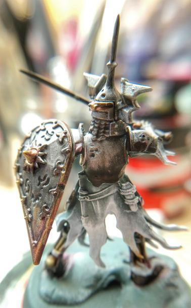 Same miniature seen from behind to show the lights and shadows on the back and shield.
