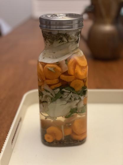 Jar of probiotic gut shot ready for fermenting.