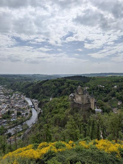 Gorgeous view over Vianden, its famous historic castle and the mostly green valley.