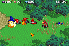 A screenshot from Mech Platoon for GBA. It shows red mechs engaging in combat with a blue Mech in a forest environment. To the right is pile of blue scrap, ready to be collected by the player.