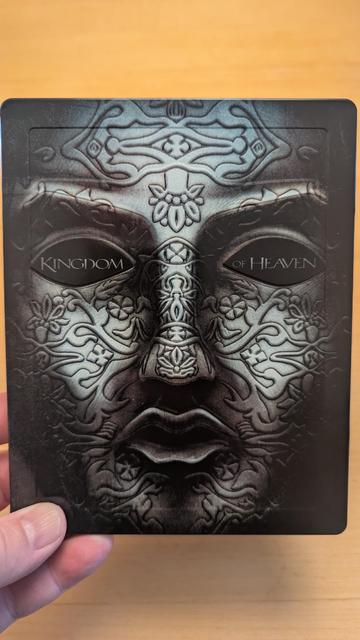 Front of the Kingdom of Heaven 4k steelbook.
The steel nask of King Baldwin with the tilte written in the eye holes.
(i don't think that Balwin actually wears a mask that looks like that in the movie)