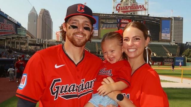 Daniel Schneemann sticks with Guardians as softball coach wife assists