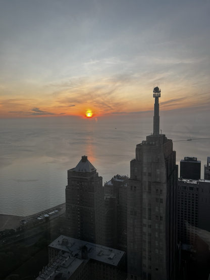 Sun rising over the lake by Chicago