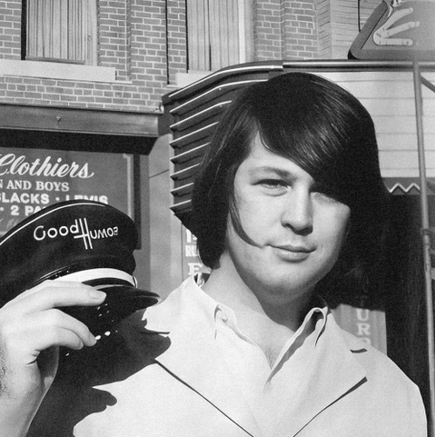 A young Brian Wilson of The Beach Boys holds a Good Humor ice cream hat.