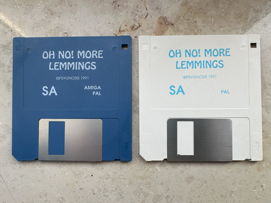 Blue and white floppy disks for "Oh No! More Lemmings".