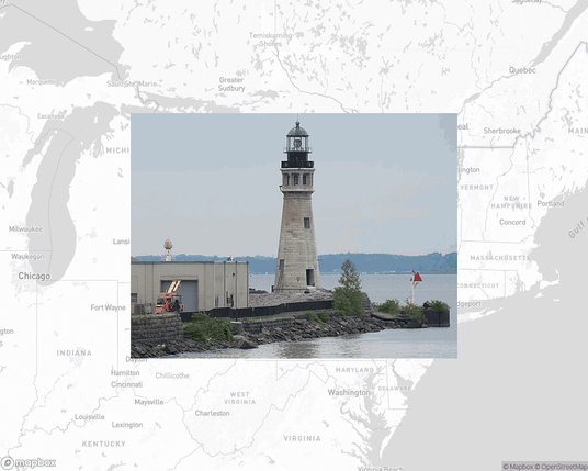 A photo of a lighthouse from the linked website, overlaid on a cropped world map where it's located.