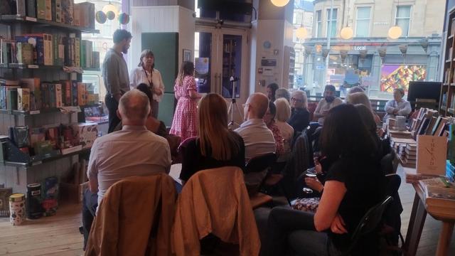 Looking over the heads of seated people awaiting the start of the Edinburgh Writers Forum, in the Edinburgh Bookshop