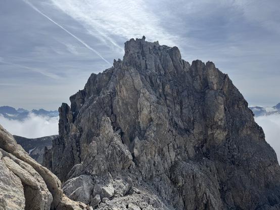 Final part of ridge towards summit, consisting of broken rocks with bizarre, almost vertical forms.