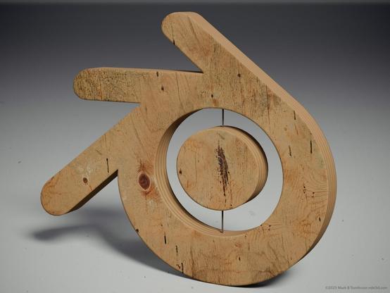 A plywood model of the Blender logo