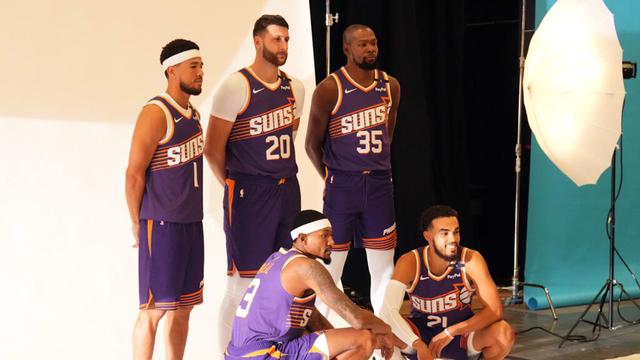 Sep 30, 2024; Phoenix, AZ, USA; Phoenix Suns guard Devin Booker (1) and Phoenix Suns center Jusuf Nurkic (20) and Phoenix Suns forward Kevin Durant (35) and Phoenix Suns guard Bradley Beal (3) and Phoenix Suns guard Tyus Jones (21) pose for a photo during Media Day at Footprint Center. Mandatory Credit: Joe Camporeale-Imagn Images