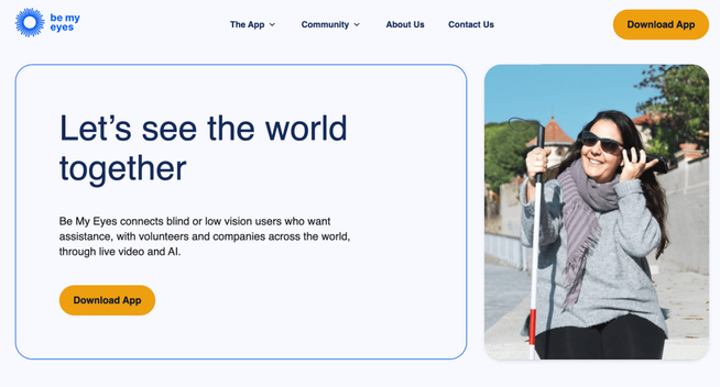 Screenshot from Be My Eyes homepage showing text 'Let's see the world together' and an image of a blind woman with dark glasses and a cane.